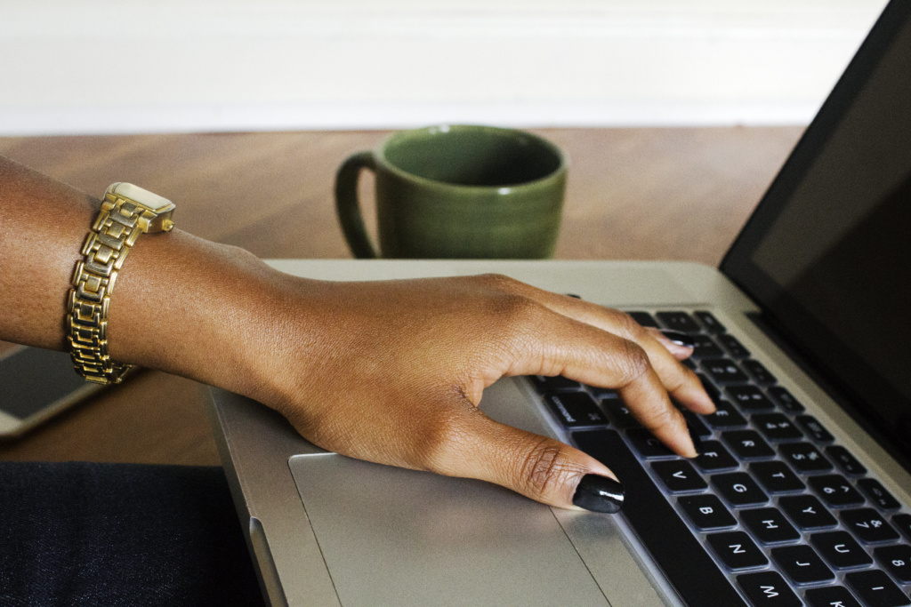 Black Girl Hand on Laptop